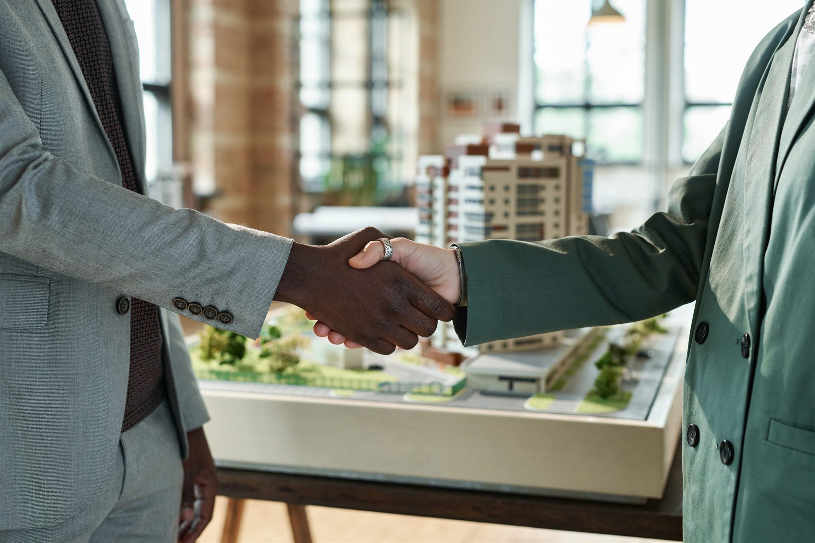 architects-shaking-hands-at-meeting