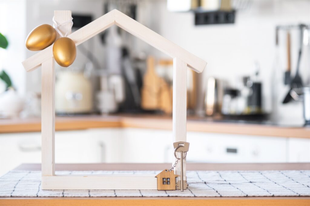 key-and-tiny-house-of-cozy-home-with-easter-decor