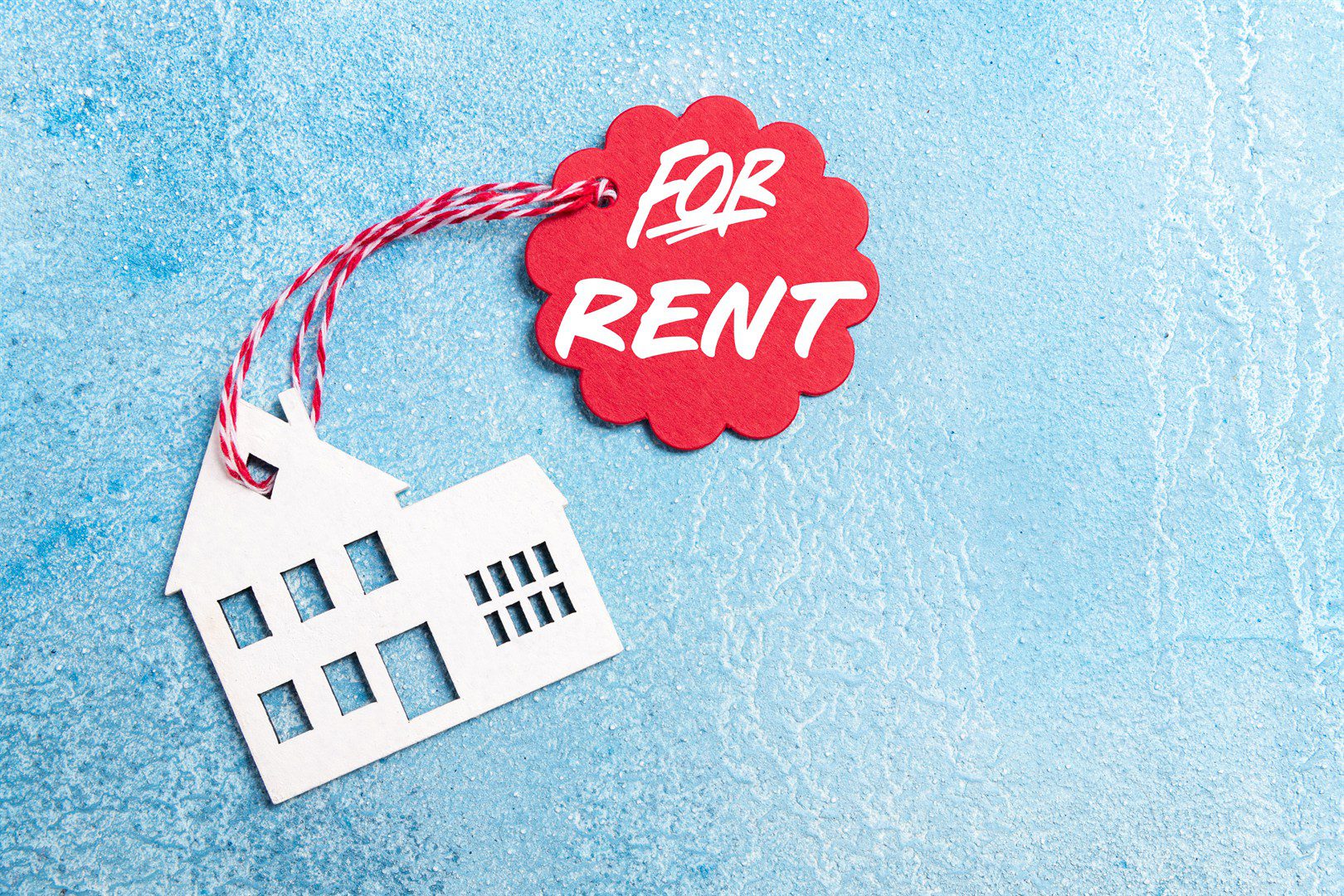 house-for-rent-label-on-christmas-holidays-wooden